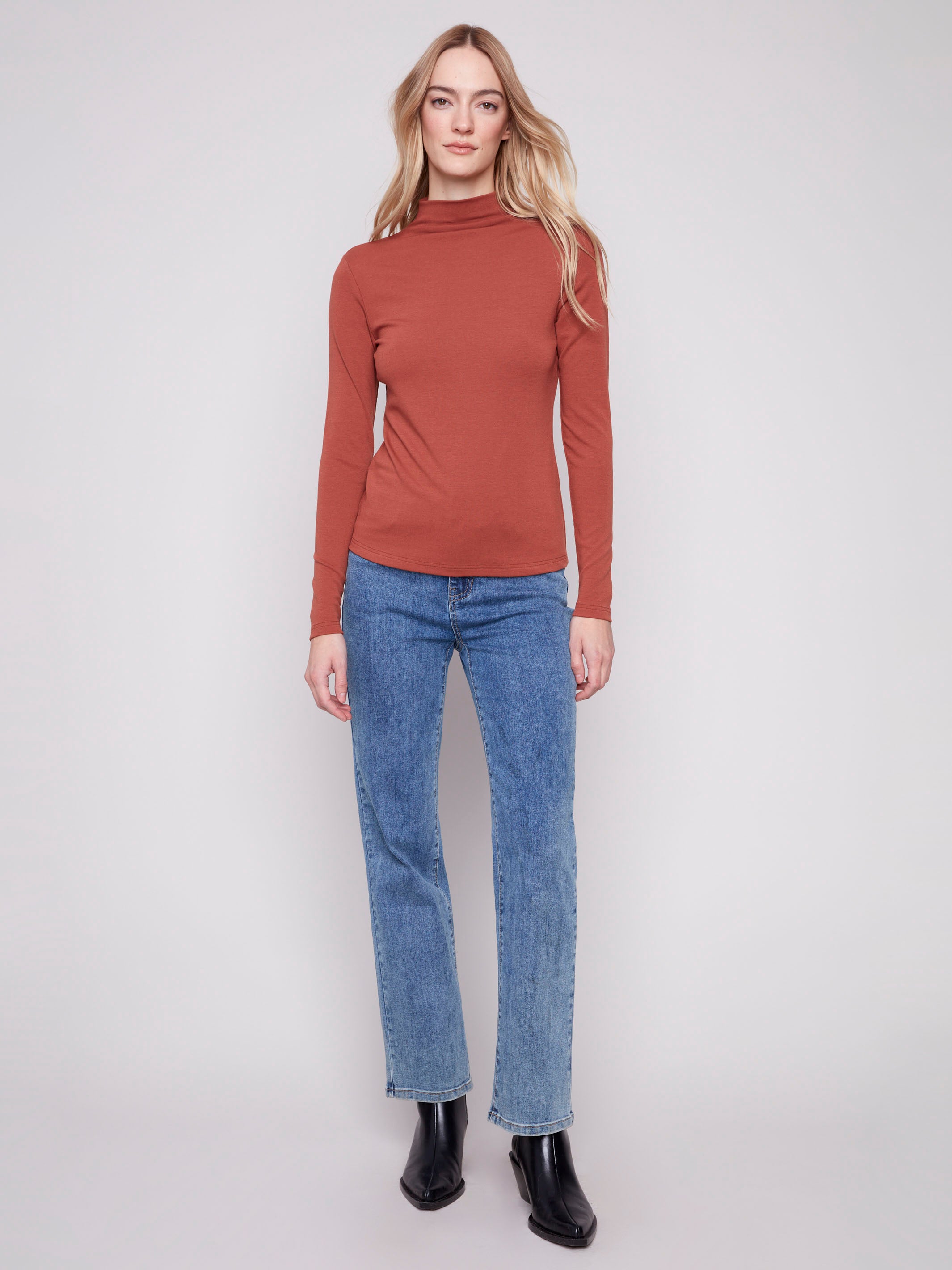 Elegant sepia mock neck top showcasing its fine ribbed texture, ideal for any occasion. A stylish choice by Charlie B.