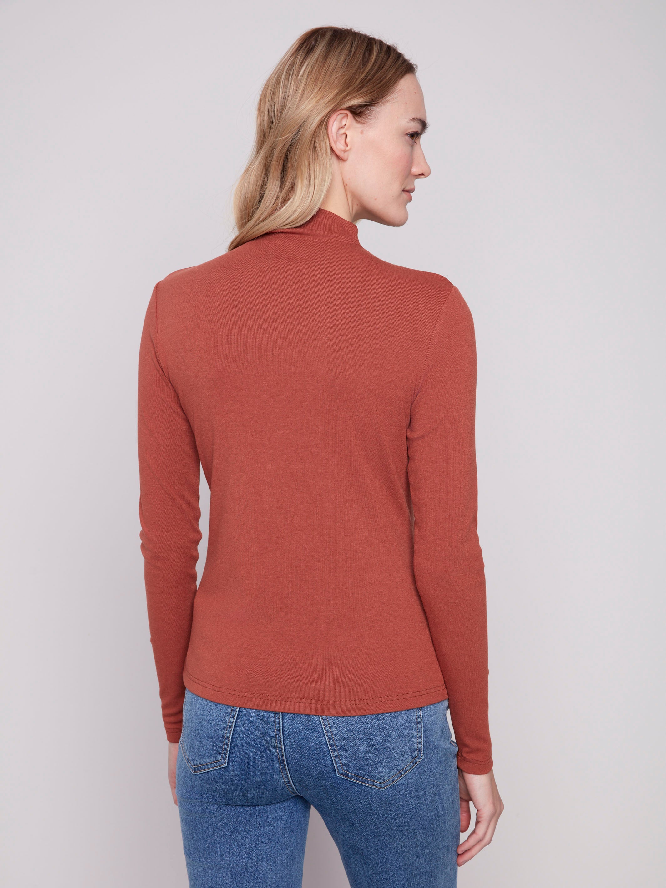 This sepia long-sleeve top offers a chic mock neck design, enhancing your wardrobe essentials effortlessly by Charlie B.
