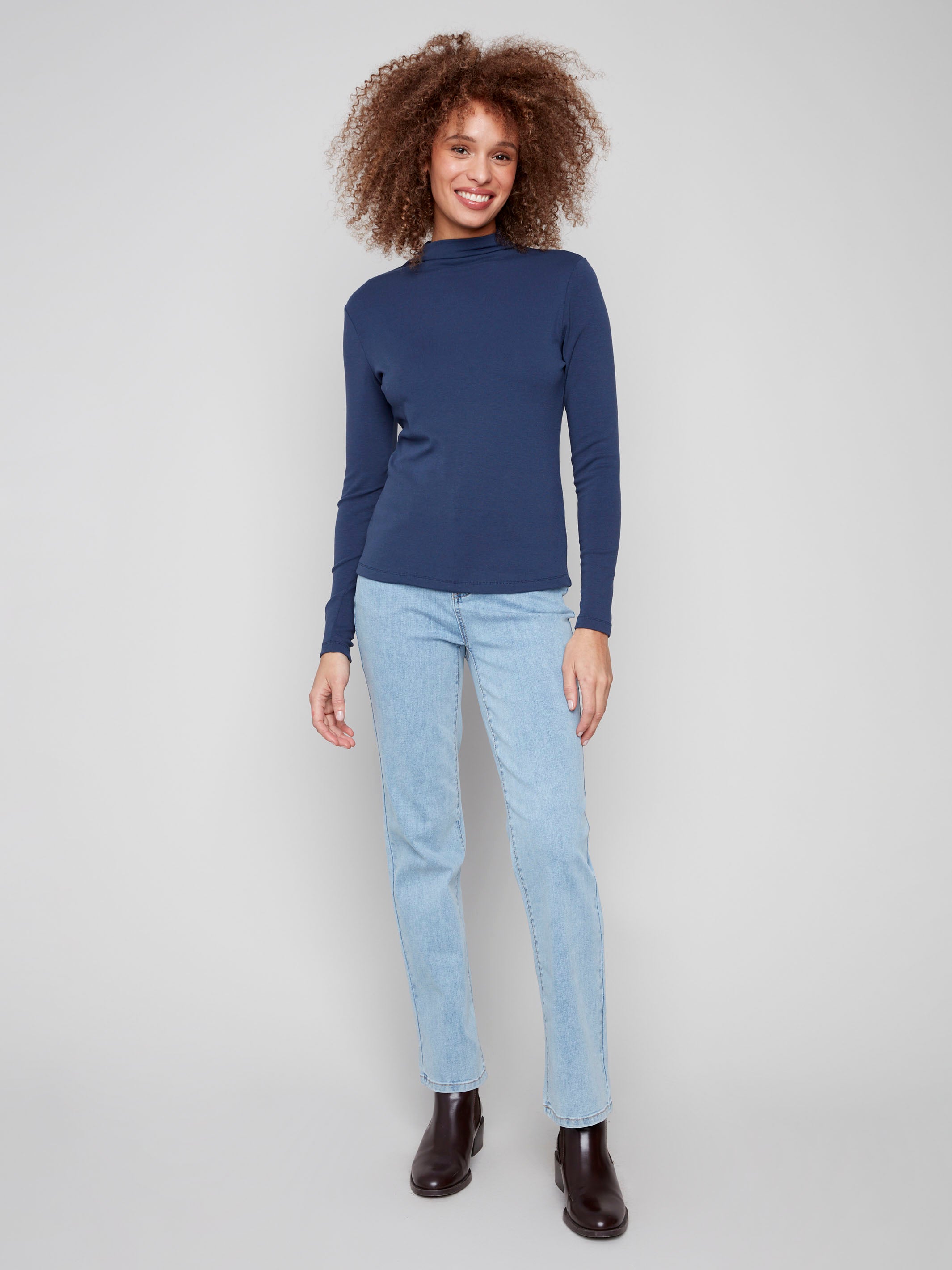 Elegant long-sleeve top in moonlight blue with a chic mock neck style by Charlie B.