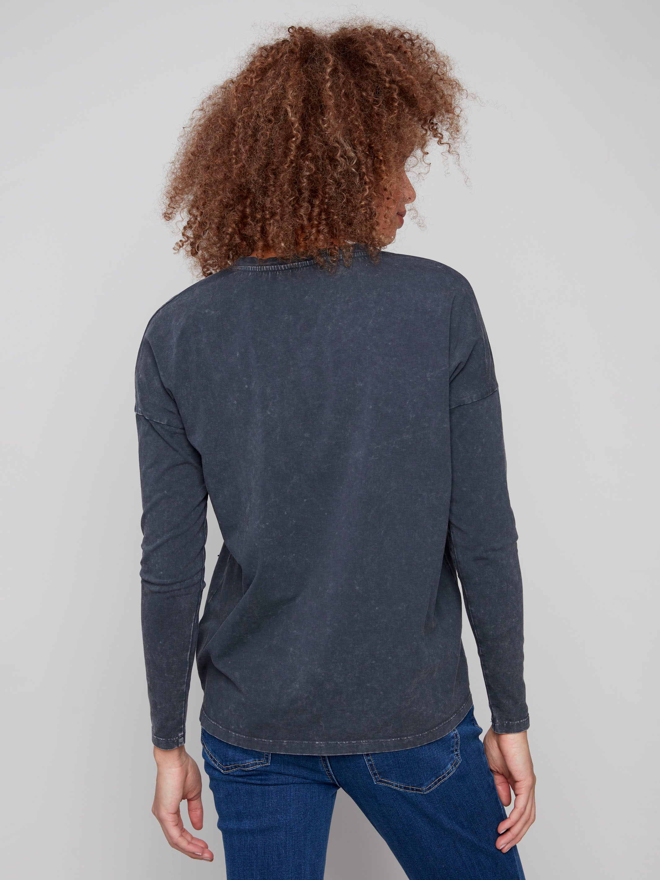 Elegant charcoal top showcasing a relaxed fit with vintage-inspired details and long dolman sleeves for added style by Charlie B.