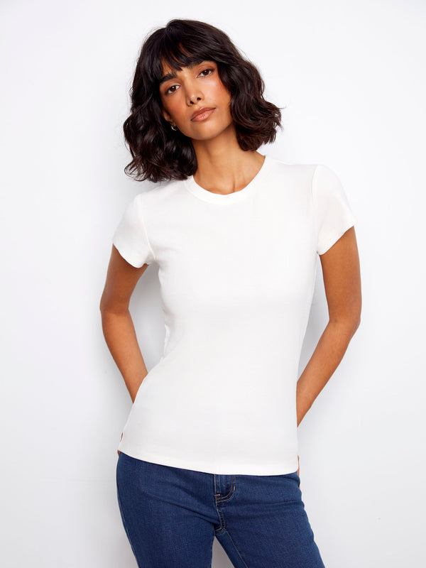 White T-shirt featuring a semi-fitted silhouette, offering a sleek and modern look by Charlie B.