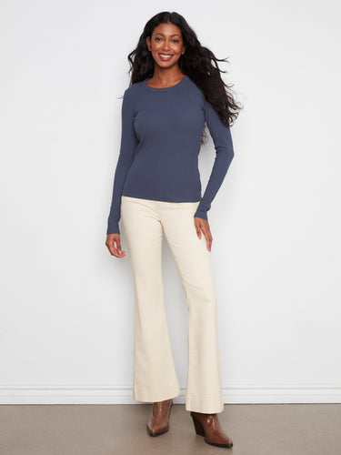 Slim fit long sleeve top in midnight blue, featuring a ribbed texture and crew neckline by Charlie B.