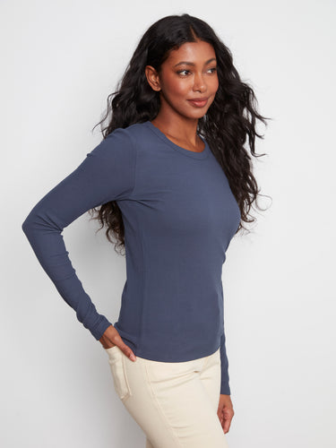 Cotton blend long sleeve top with ribbed texture and crew neck, offering a slim fit style by Charlie B.
