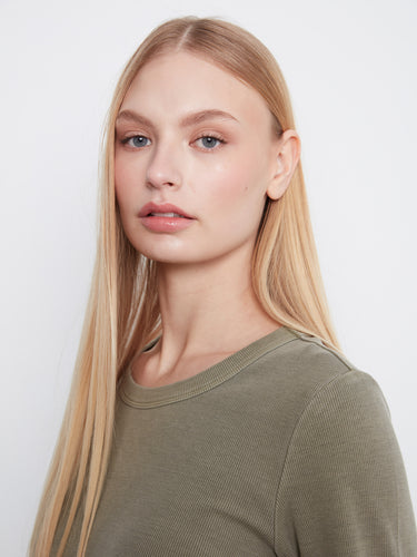 Close-up of crew neckline on an olive slim fit top, showcasing its elegant simplicity by Charlie B.