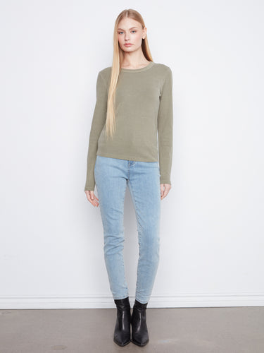 Full-length view of slim fit olive top paired with jeans, emphasizing casual elegance by Charlie B.