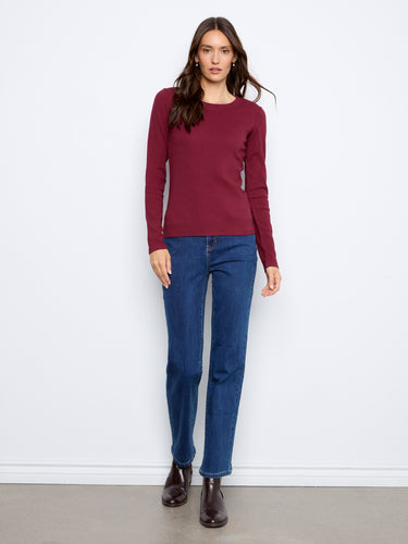 The slim fit design of this top ensures a flattering silhouette, offering both style and ease in every movement by Charlie B.