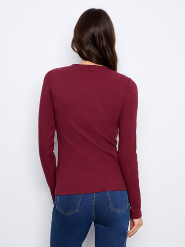 A ribbed texture adds a touch of sophistication to this versatile long sleeve top, ideal for layering or wearing alone by Charlie B.
