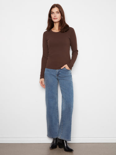 This brown top features long sleeves, offering a perfect blend of warmth and elegance by Charlie B.