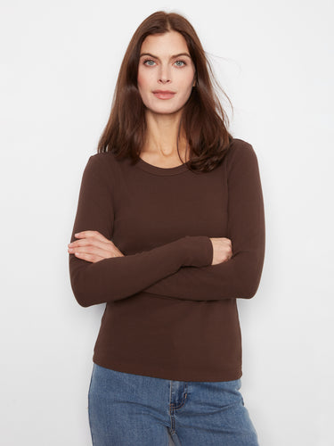 The slim fit design of this brown top provides a sleek and modern silhouette by Charlie B.