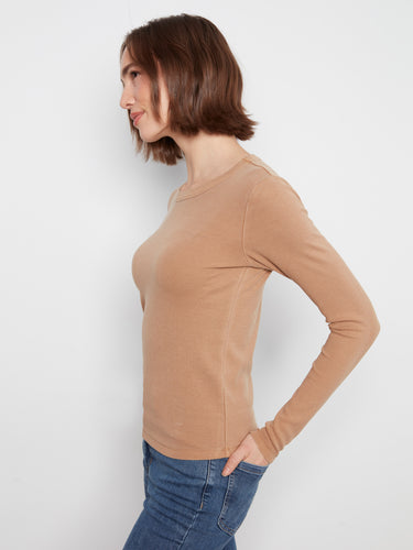 Trendy beige top in a slim fit cut that complements any outfit effortlessly. Crafted with care by Charlie B.