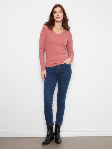 Enjoy the comfort of long sleeves in this slim fit top, ideal for layering or wearing alone. Made with premium materials by Charlie B.