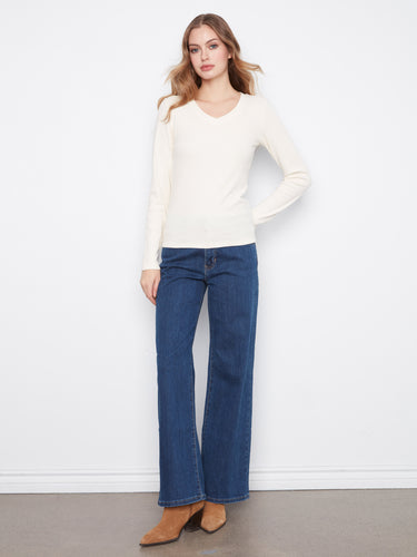 Featuring long sleeves, this ribbed top offers both comfort and style by Charlie B.