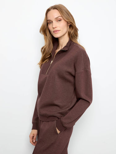 Long sleeves offer warmth and comfort in this trendy apparel by Charlie B.
