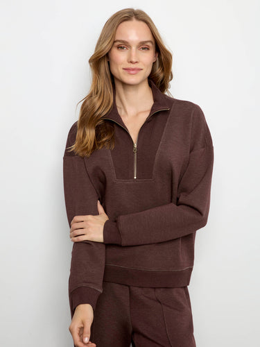 Soft scuba fabric enhances the cozy feel of this chic garment by Charlie B.