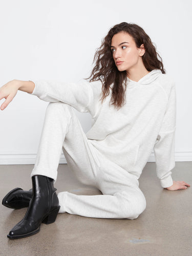 Crafted from stretch fabric, these heather-light grey jogger pants ensure ease of movement while maintaining a chic look by Charlie B.