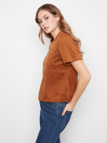 Faux suede top in a rich toffee shade, designed with a side slit for added style by Charlie B.