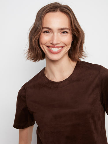 Chic design with a back zipper for easy wear, enhancing both style and functionality. By Charlie B.