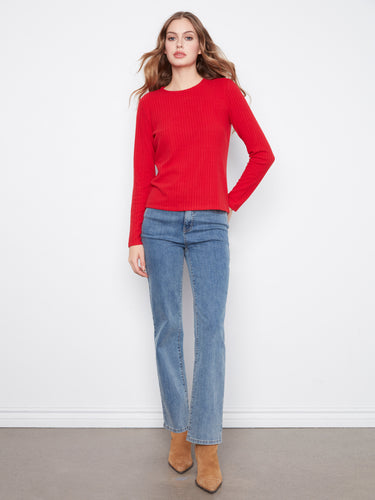 Long sleeves add elegance to this red top, making it ideal for transitional weather and layering by Charlie B.