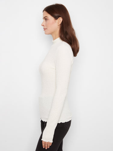 This slim fit design hugs the body beautifully, making it an excellent choice for chic and modern styling options by Charlie B.