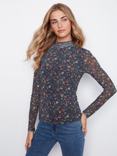 Floral top with a mock neckline crafted from stretch mesh fabric, offering a stylish and comfortable fit by Charlie B.
