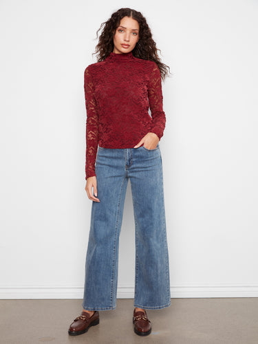 Designed with long sleeves, this top provides both style and coverage, making it ideal for cooler days by Charlie B.