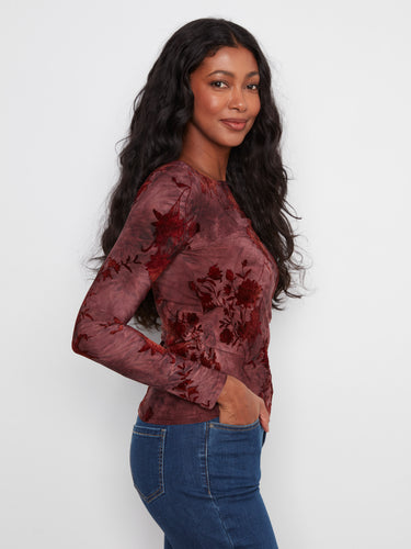 Stylish slim-fit top with intricate floral details that offer a sophisticated touch to any ensemble by Charlie B.