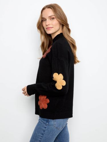 Stylish ensemble with ribbed cuffs elevating the overall look of this charming sweater by Charlie B.