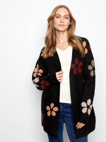 Fashionable cardigan showcasing intricate bouclé flowers for a unique touch by Charlie B.