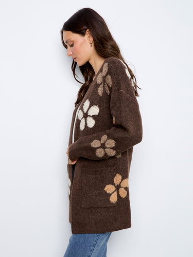 This longline silhouette cardigan offers both comfort and style for cooler days. By Charlie B.