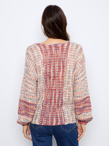 Experience the comfort of long sleeves in this stylishly relaxed fit sweater. By Charlie B.