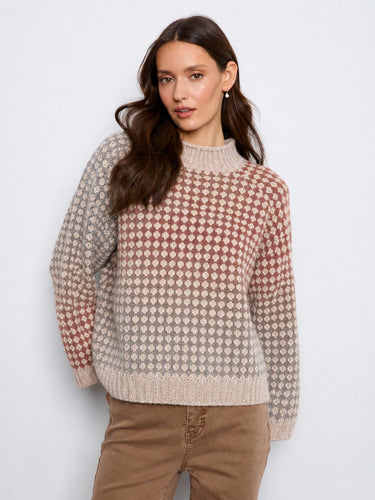 Stylish sweater featuring a mock neck design, perfect for adding a touch of elegance to your wardrobe. By Charlie B.