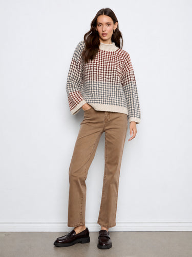 This chic sweater boasts 3/4 bell sleeves, offering a unique flair and comfortable fit. By Charlie B.