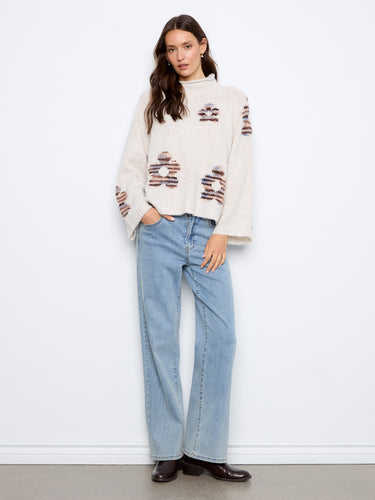 The relaxed fit of this sweater ensures comfort and ease of movement, making it ideal for everyday wear by Charlie B.
