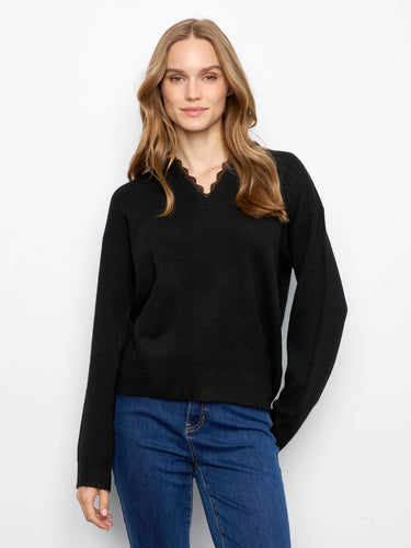 Sweater with V-notch neckline featuring leopard print trim adds a chic touch to any outfit by Charlie B.