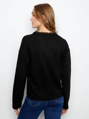 Back view highlighting the seamless drop shoulder design and soft texture of this stylish sweater. By Charlie B.