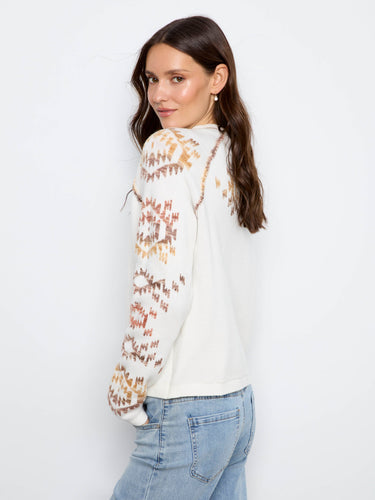 A crew neckline complements the intricate pattern on this comfortable and stylish garment. By Charlie B.