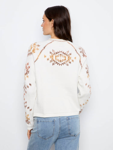 Experience warmth with its double-layer knit construction, perfect for chilly days ahead. By Charlie B.