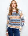 The sweater features a crew neckline and vibrant patterns, perfect for a relaxed look by Charlie B.