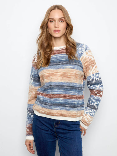 The sweater features a crew neckline and vibrant patterns, perfect for a relaxed look by Charlie B.