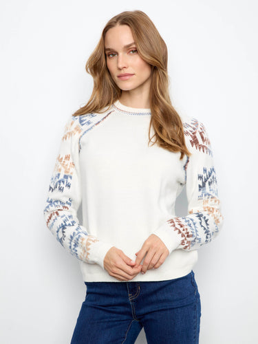 Showcasing a reversible design, this sweater offers versatile style options by Charlie B.