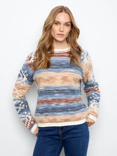 Switch up your look effortlessly with the reversible design of this cozy sweater by Charlie B.