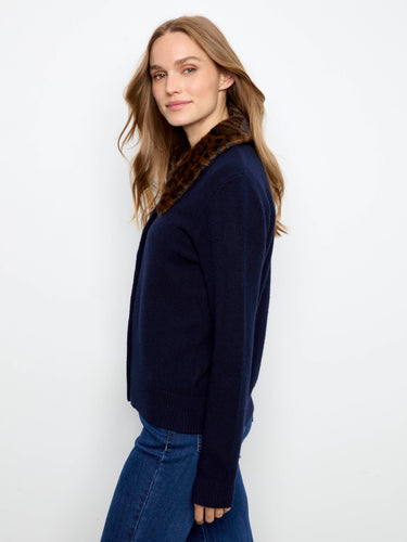 Chic navy cardigan crafted with long sleeves and a classic button-up design by Charlie B.