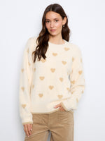 Elegant sweater featuring a classic crew neckline, perfect for a chic and cozy look. By Charlie B.