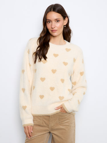Elegant sweater featuring a classic crew neckline, perfect for a chic and cozy look. By Charlie B.