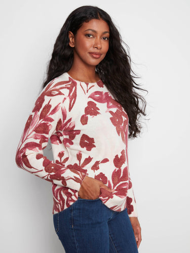 Reversible floral print adds versatility to this cozy sweater. A must-have piece that enhances any outfit effortlessly by Charlie B.