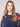 Stylish denim sweater showcasing exquisite floral embroidery and comfortable knit cuffs by Charlie B.