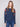 Heather denim sweater with crew neckline and vibrant floral details on sleeves by Charlie B.