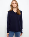 A soft knit sweater featuring a flattering V-neckline, perfect for layering or wearing alone. By Charlie B.