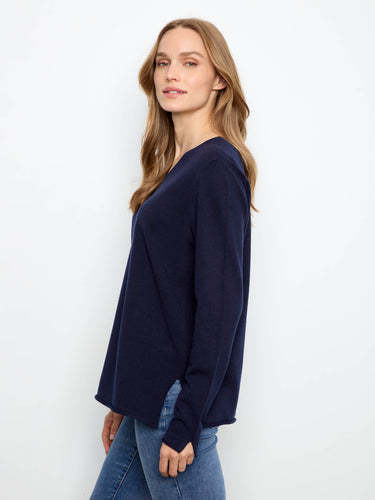 Designed with side slits, this sweater provides ease of movement and a chic touch to your look. By Charlie B.