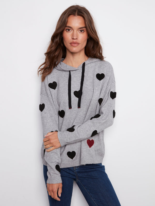 Grey hoodie sweater showcasing embroidered hearts in bouclé on a soft fabric for comfort and style by Charlie B.